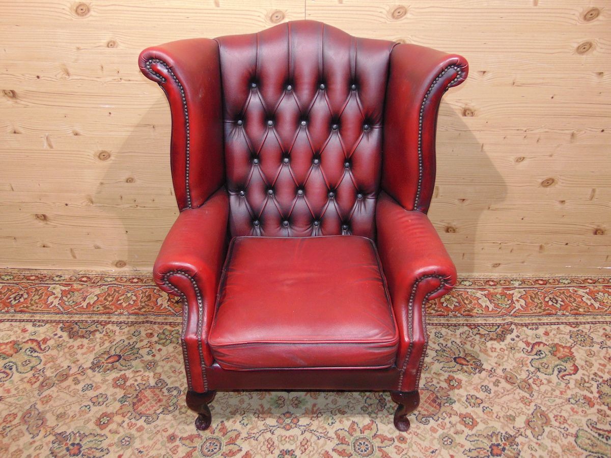 Burgundy Chesterfield armchair 1903..jpg