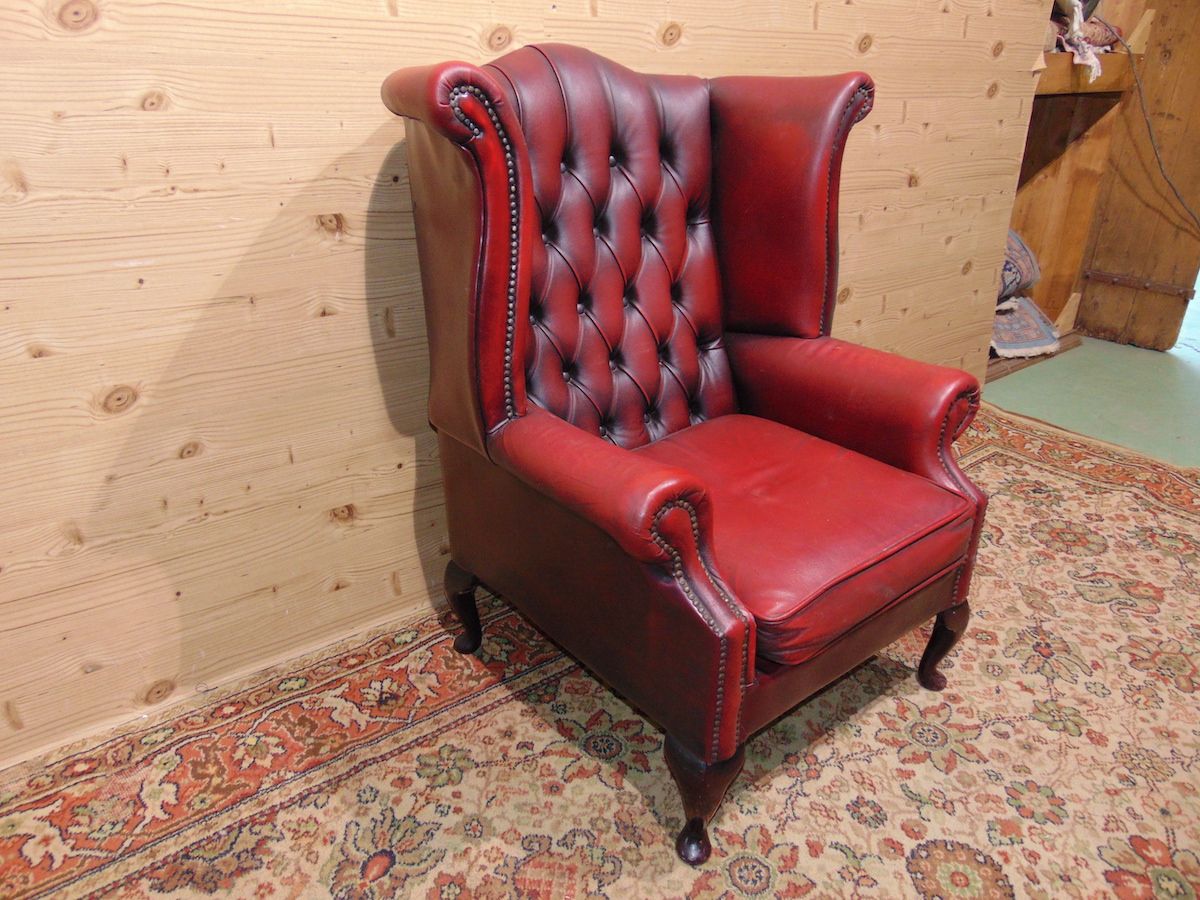 Burgundy Chesterfield armchair 1903...jpg